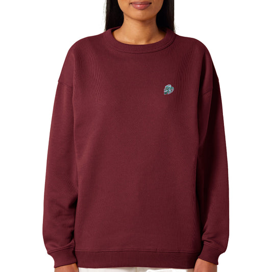Crewneck Sweatshirt in Burgunder. Verschiedene Größen erhältlich mit Pflanze auf der Brust bestickt.